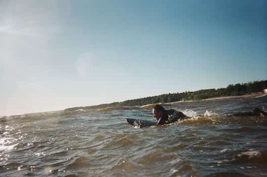 Person Doing Surfing