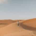 Man Walking on Desert