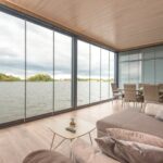 Interior of contemporary house on lake on cloudy day