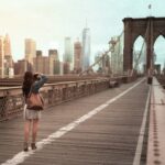 Photo Of Woman On Standing On Wooden bridge