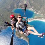 Selfie of Couple in Air on Parachute
