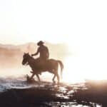 Silhouette of a Man Horseback Riding
