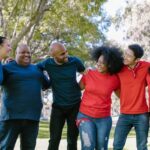 Group of People Wearing Blue and Red Shirts