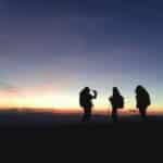 Silhouette of Three People
