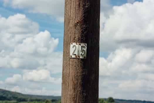 White Metal 25-embossed Signage on Post