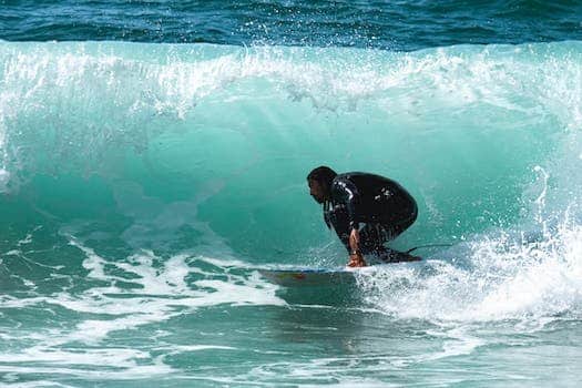 Photo Of Man Surfing